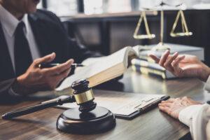 Good service cooperation, Consultation of Businesswoman and Male lawyer or judge counselor having team meeting with client, Law and Legal services concept.
